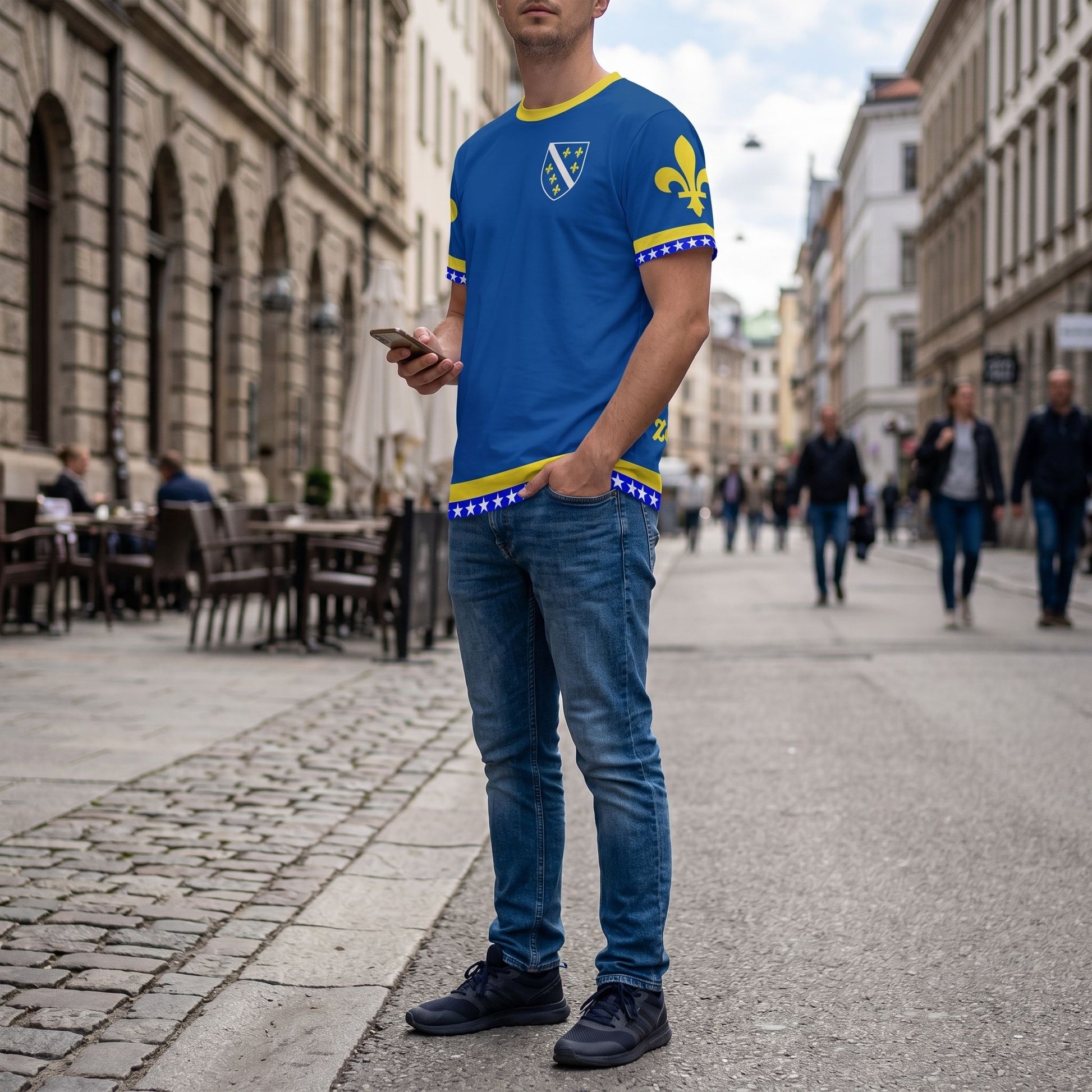 Fan in urban environment wearing Bosnia jersey highlighting vibrant all-over print and relaxed fit.