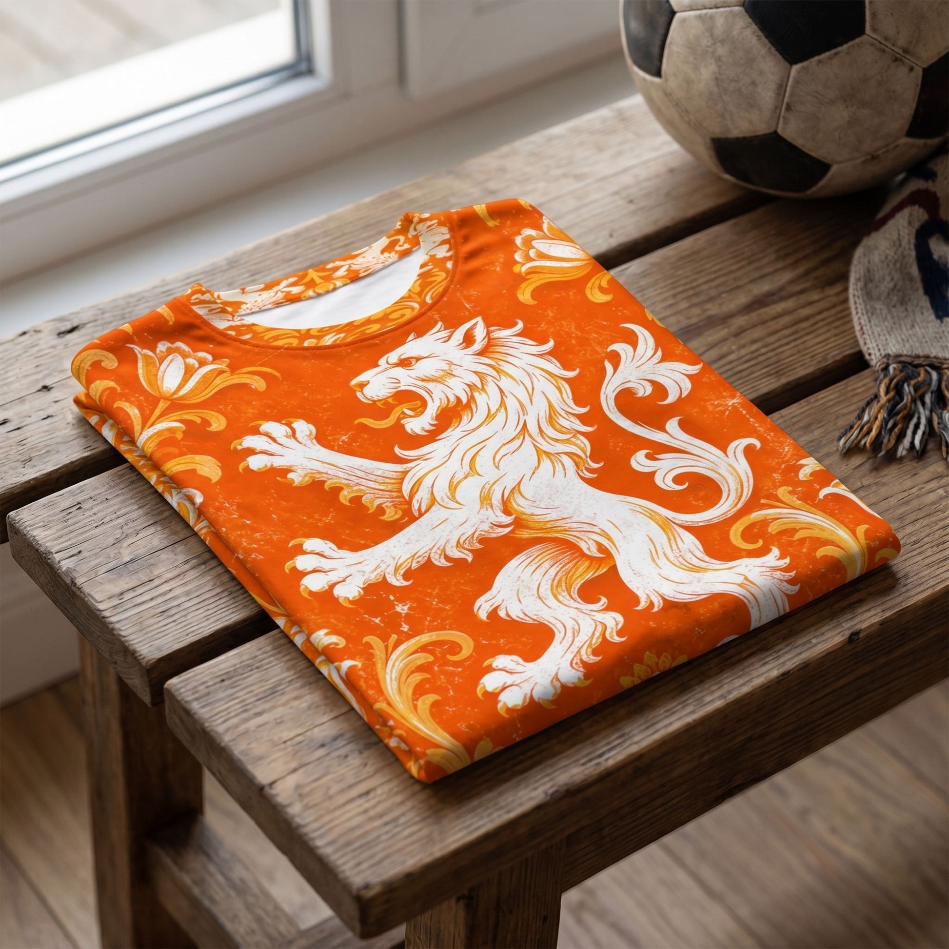 Side view of Netherlands football jersey on hanger, showcasing edge-to-edge print, fabric texture, and sleek silhouette against neutral background.